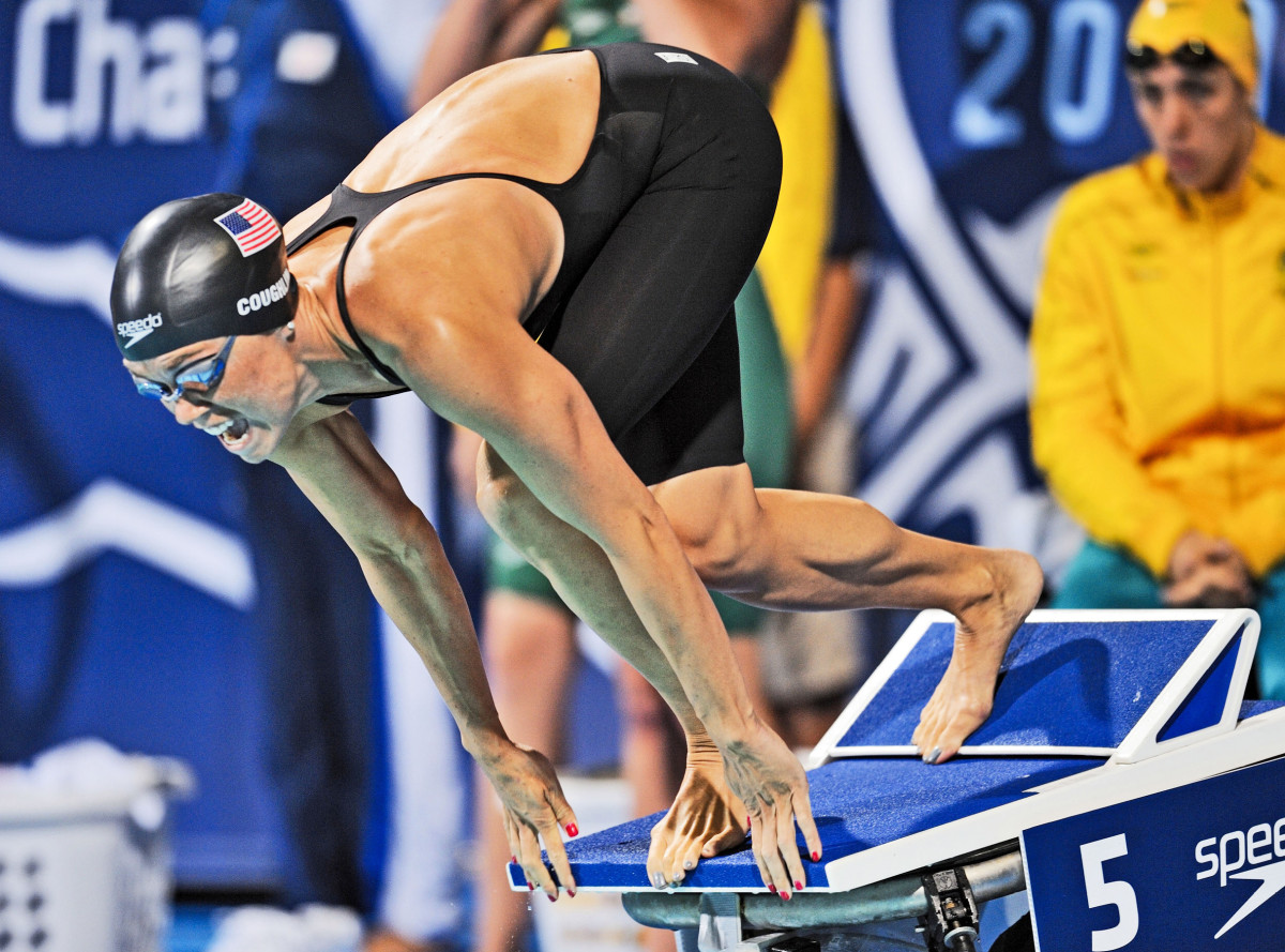 DIVING IN Coughlin, who won 12 medals at three Games, now uses her stroking power to punch down grapes.